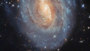 Hubble Captures Dazzling Portrait of Spiral Galaxy NGC 6000, Revealing Stellar Life Cycle